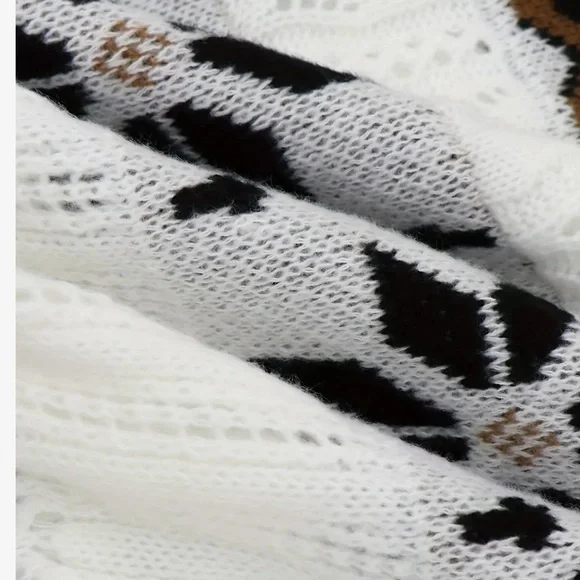 Nordic Snowflakes Open Knit Cardigan
Eclectic Grandpa Sweater - Picture 6 of 9